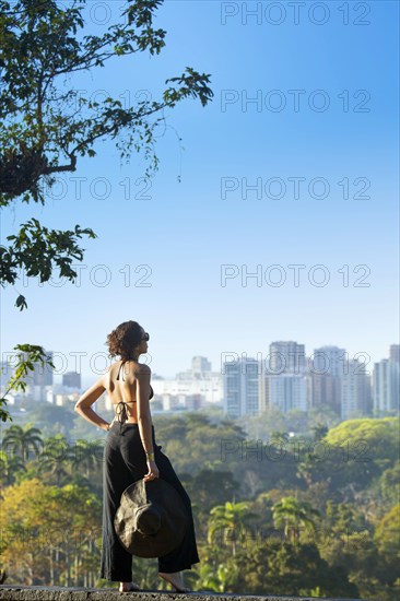 Mixed race woman admiring cityscape