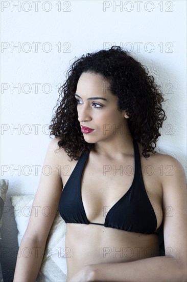 Mixed race woman wearing bikini