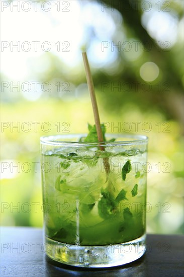 Close up of mojito cocktail in glass