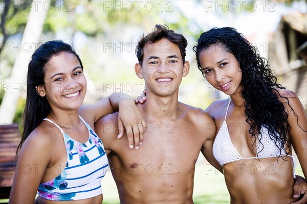 Friends smiling outdoors