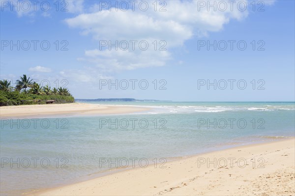 Clouds over ocean and beach