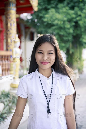 Portrait of smiling Asian woman