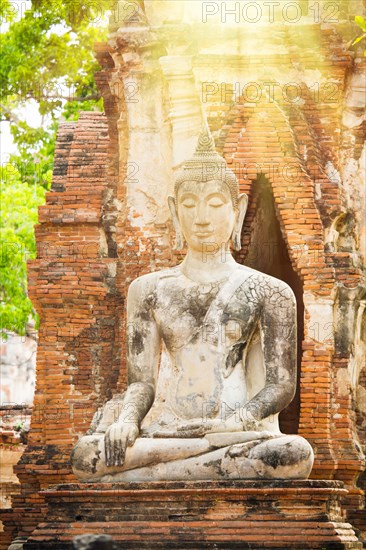 Sunbeams on Buddha statue