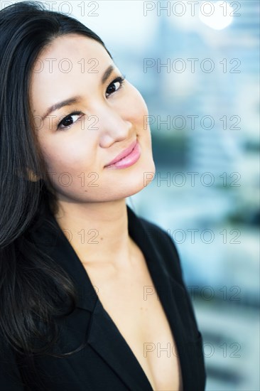 Portrait of smiling Asian woman