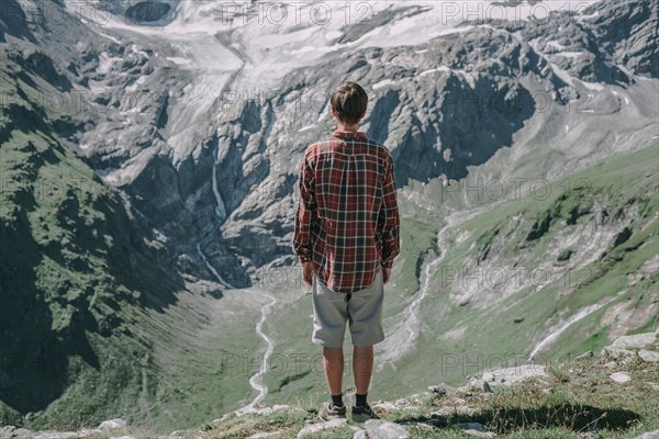 Caucasian man admiring scenic view of mountain