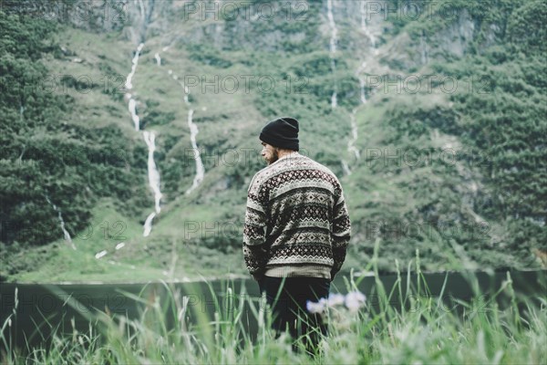 Caucasian man admiring scenic view of river