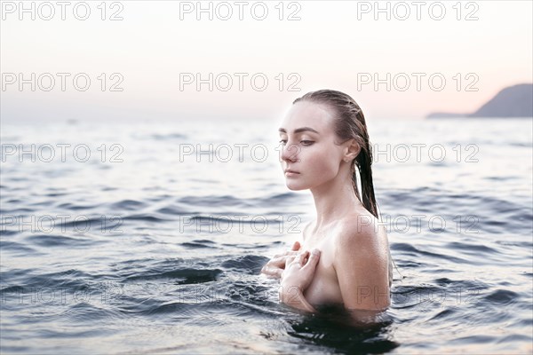 Caucasian woman swimming