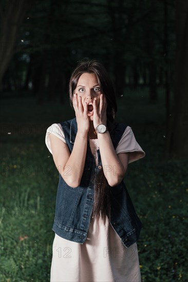 Caucasian woman surprised at night