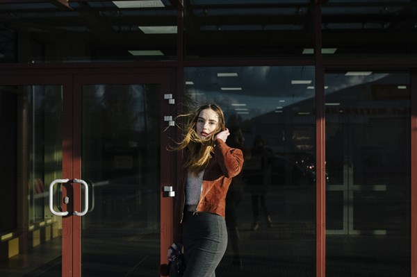 Wind blowing hair of Caucasian woman