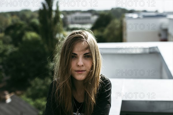 Wind blowing hair of Caucasian girl