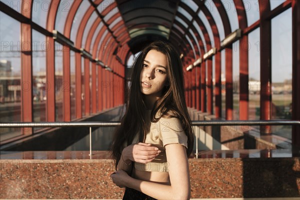 Portrait of Caucasian woman near arches outdoors