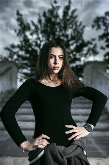 Portrait of Caucasian woman with hands on hips