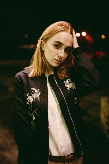 Caucasian woman wearing floral jacket