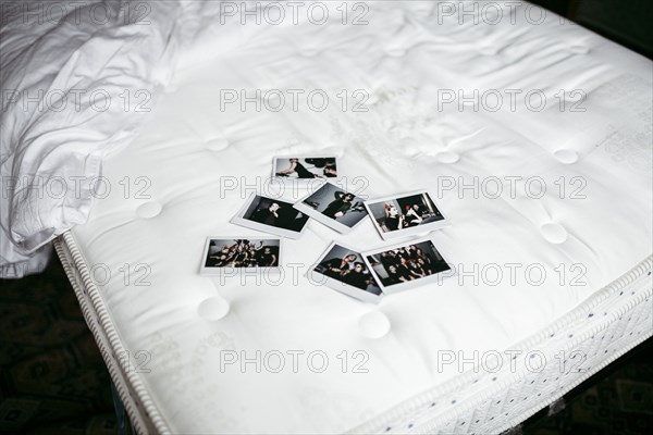 Photographs on bed mattress