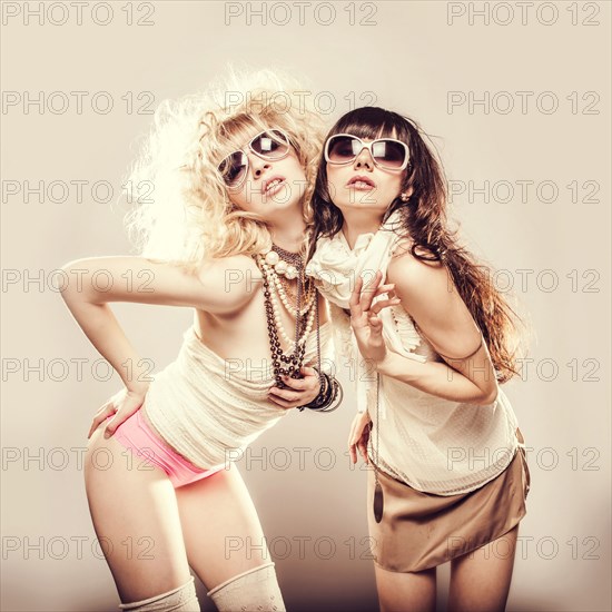 Caucasian women posing together