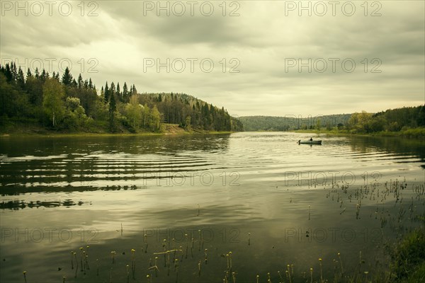 Boat on rural lake