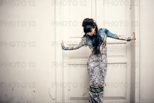 Caucasian woman standing in doorway