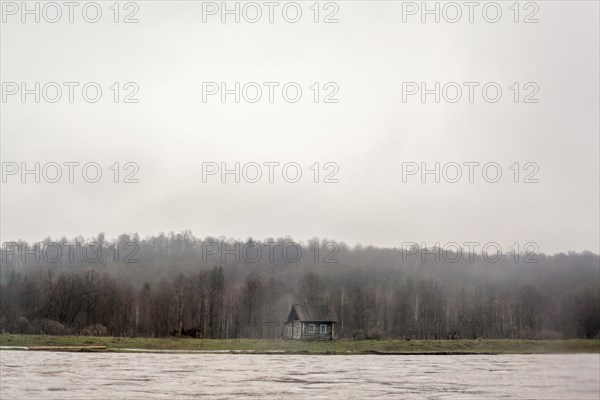 House built by rural river