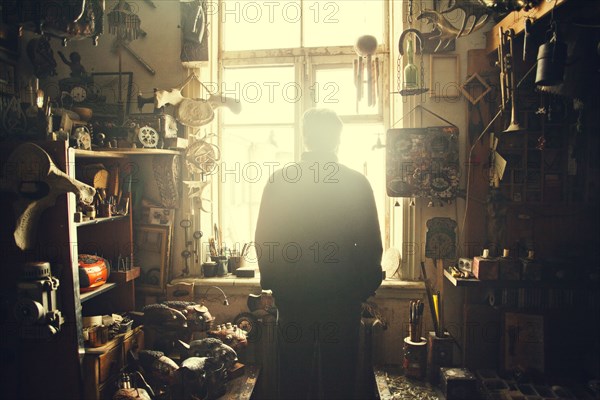 Caucasian man standing in workshop