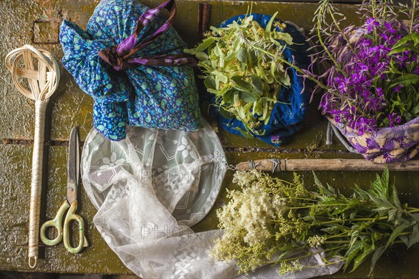 Fresh flowers and muslin arranged on table