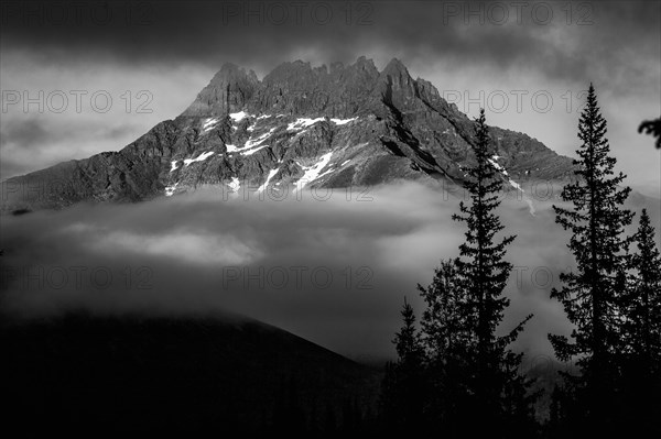 Mountain and clouds in remote landscape