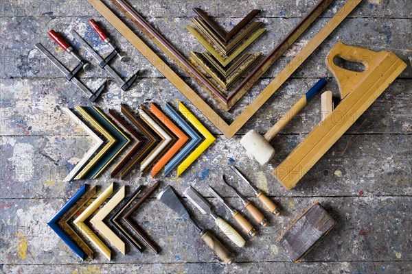 Picture frame tools on splattered table