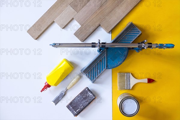 Wooden boards with paint and tools