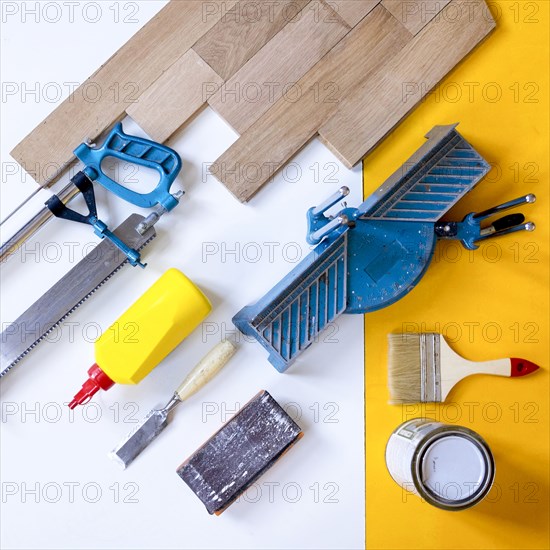 Wooden boards with paint and tools