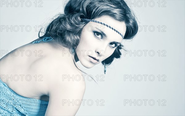 Portrait of serious Caucasian woman wearing headband