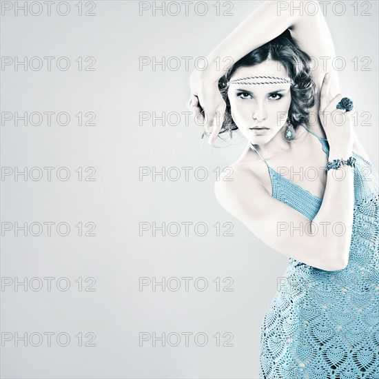 Portrait of serious Caucasian woman wearing headband