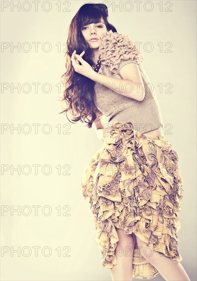 Caucasian woman wearing ruffled skirt