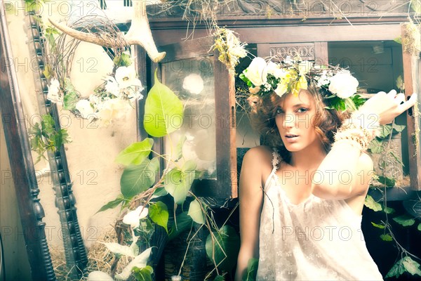 Portrait of serious Caucasian woman sitting in garden