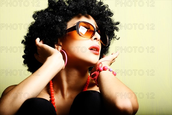 Portrait of glamorous woman wearing sunglasses