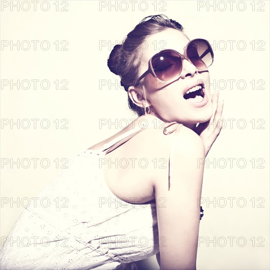 Portrait of glamorous woman wearing sunglasses