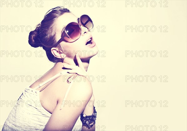 Portrait of glamorous woman wearing sunglasses