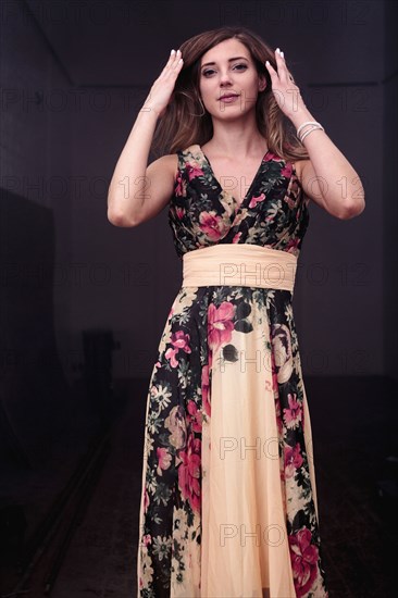 Caucasian woman wearing floral dress