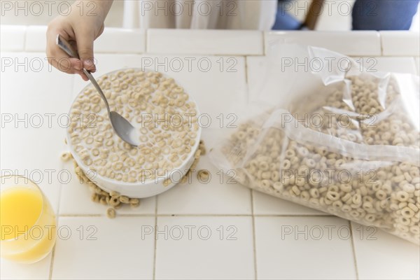 Girl eating bowl of cereal