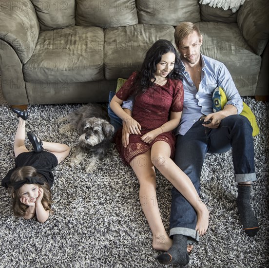 Family relaxing in living room