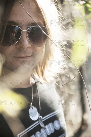 Caucasian man wearing sunglasses outdoors