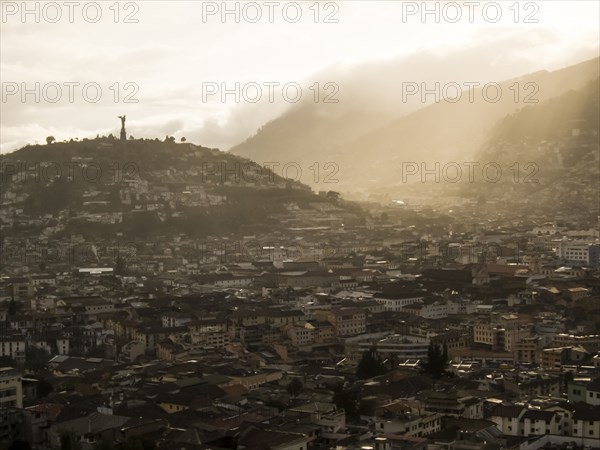 Fog over mountain cityscape