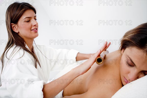 Hispanic woman having massage