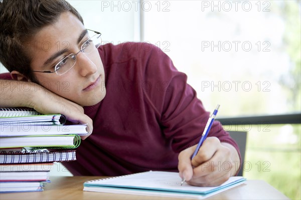 Hispanic college student doing homework