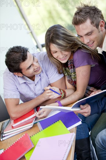 Hispanic college students doing homework