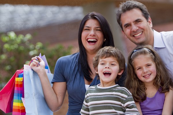 Hispanic family shopping together