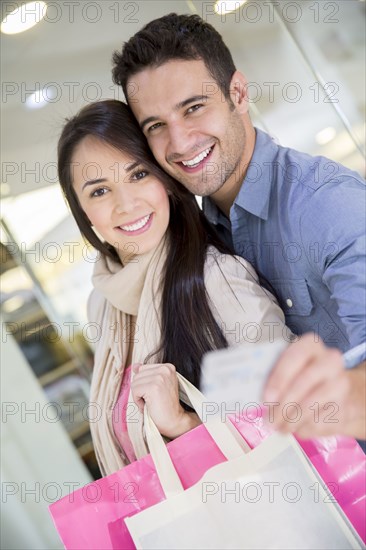 Hispanic couple shopping together