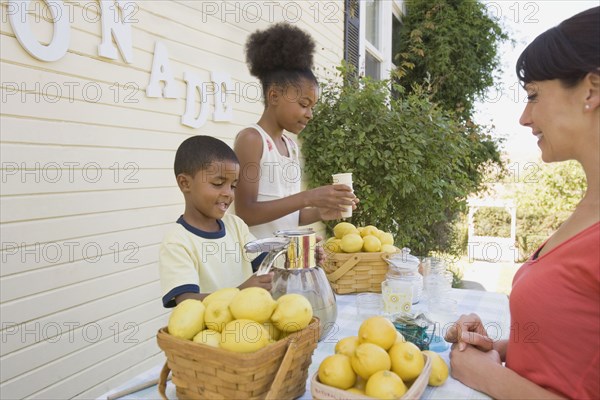 Customer at lemonade stand