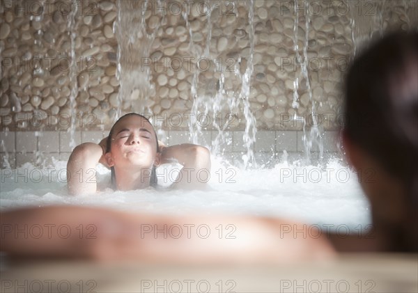 Woman enjoying hydrotherapy treatment