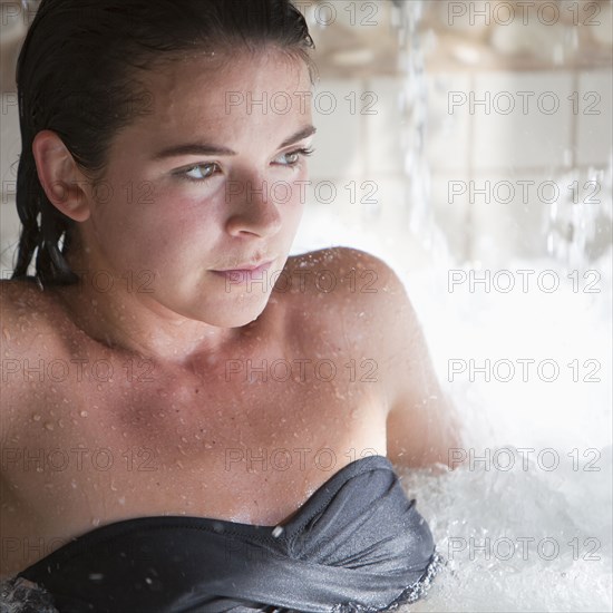 Woman enjoying hydrotherapy treatment