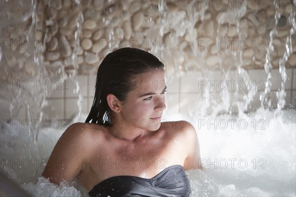 Woman enjoying hydrotherapy treatment