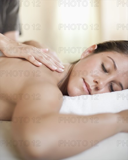 Caucasian woman having a massage